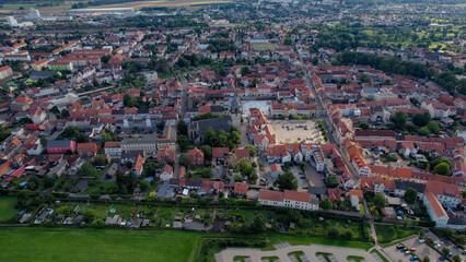 An Aerial panorama view around the old town of the city Haldensleben on an early summer day in Germany.