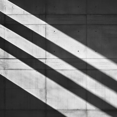 Aufkleber - Monochromatic abstract image showcasing the texture of a concrete wall bathed in dramatic shadows, creating a striking minimalist visual impact representing modern architecture.