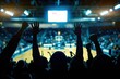 © alisaaa - Basketball Excitement Fans excited at basketball game. Silhouetted fans raising arms in celebration at a basketball game.