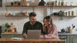 © Natallli - The Couple Using Laptop