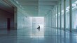 © VK Studio - A lone figure sits in the middle of a vast, minimalist corridor flooded with natural light, creating a sense of solitude and reflection.