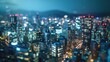 © VK Studio - A dazzling night-time cityscape featuring illuminated skyscrapers and densely packed urban buildings under a dark sky.