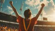 © VK Studio - A person in a stadium celebrates with arms raised, adorned with medals, capturing the spirit of triumph and the collective joy of a victorious moment.