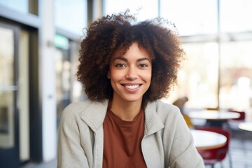 Wall Mural - Portrait of a smiling female African American medical nurse