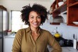 © CojanAI - Portrait of a middle aged African American fit woman in healthy kitchen