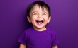 © Zaleman - The image of a smiling asian baby on a color background was generated by generative AI technology.