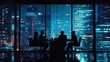 © Sheela - A business meeting in a high-rise office building at night.
