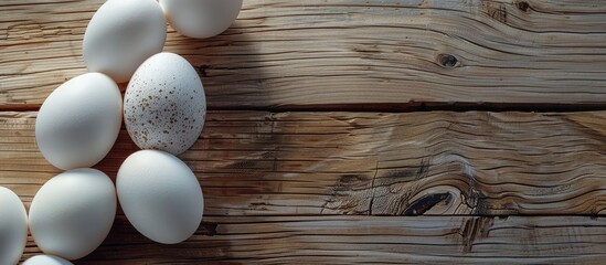 Sticker - eggs on a wooden background. Copy space image. Place for adding text and design