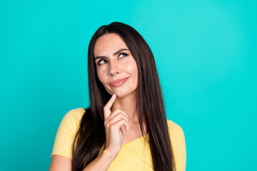 Wall Mural - Photo of nice young woman look empty space wear top isolated on teal color background