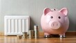 © Man888 - A thermostat set to a low temperature, coins and a piggy bank nearby, symbolize reduced energy consumption and cost-effective home heating solutions.