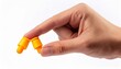 © Christopher - Hand holding Ear plugs isolated on white background.