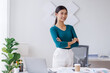 © David - Portrait of young Asain business woman standing with confidence expression arms crossed and looking at the camera in the office.