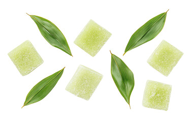 Stylish arrangement of green herbal cubes and fresh leaves, perfect for wellness and spa themed projects.