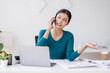 © David - Cheerful business Asian woman freelancer making telephone call share good news about project working in office workplace, business finance concept.