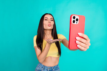 Poster - Portrait of nice young woman smart phone selfie kiss wear top isolated on turquoise color background