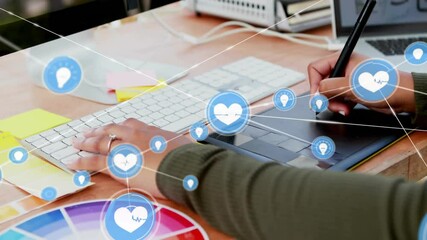 Wall Mural - Typing on keyboard and using tablet, person with health icons animation over desk