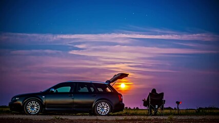 Wall Mural - watching the full moon, blood moon, harvest moon, blue moon, rising over a starry countryside - time