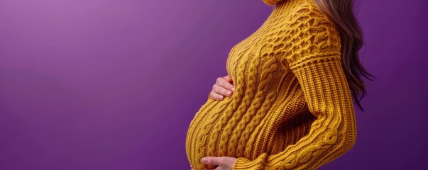 Poster - Elegant pregnant woman in a purple dress, gently holding her belly, radiating joy and anticipation. Free copy space for banner.