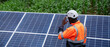 © NewSaetiew - Service engineer check and maintenance solar panels in cultivation area. Clean energy concept.