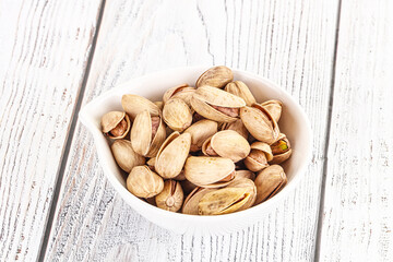 Wall Mural - Salted tasty pistachio nuts heap