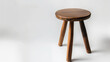 © Bonsales - Wooden stool with round seat and three sturdy legs. Dark polished finish enhances rustic charm and simple design