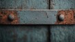 ©  Shomixer - A focused shot of rusted metal brackets fastened to a weathered wooden surface, illustrating the effects of time, exposure, and the blend of industrial elements with natural decay.