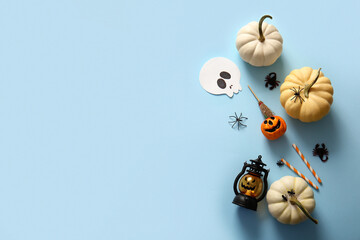 Wall Mural - Halloween composition with fresh pumpkins and decor on color background