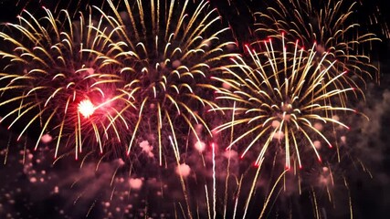 Aufkleber - A fireworks display with many different colored fireworks. The fireworks are in the air and are lit up, creating a beautiful and vibrant scene. Scene is celebratory and festive