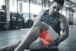 © FremtonClay/peopleimages.com - Man, gym and thigh pain from fitness injury with overlay, exercise accident and hamstring risk of tendinitis. Athlete, legs and red glow for performance fail, muscle problem and sports emergency