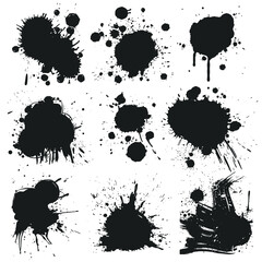 Wall Mural - Collection of various black ink splatters and paint drips on a white background.