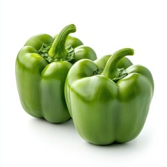 Two Fresh Green Bell Peppers Isolated on White Background