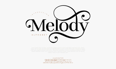 Canvas Print - Melody typography beauty fashion elegant minimalist serif italic fonts decorative wedding vintage retro logos. Minimal luxury font alphabet logo. Vector illustration