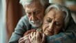 © Postproduction - Compassionate elderly couple consoling each other during a time of shared loss. Representing the importance of human connection, love, and resilience.
