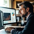 © sok - Businessman analyzing financial data on computer