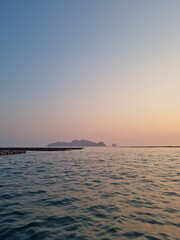 Wall Mural -  This is the sunset over the sea where the fish farm is located.
