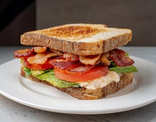 Wall Mural - Sandwich with bacon and tomato on a plate