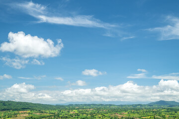 Wall Mural - beautiful white clouds and blue sky with beautiful natural landscape of mountains.