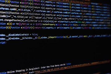 software source code. programming code. programming code on computer screen. developer working on pr