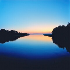 Poster - Calm River at Sunset with Silhouetted Trees and Reflections