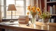 © Aliando - Cozy Table with Flowers and Books