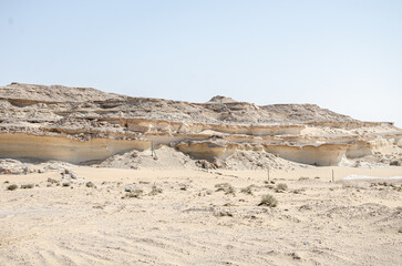 bu salwa shelf hills desert landscape with limestone hillocks in the background