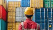 © Intelligent Horizons - Professional Engineer Wearing Safety Gear Carefully Inspecting the Security Seal on a Large Cargo Container at a Bustling Logistics Hub or Industrial Warehouse Facility