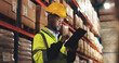 © peopleimages.com - Inspection, black man or tablet in warehouse for checklist, distribution or stock management. Supply chain, employee or supervisor with tech for shipping orders, quality control or logistics at night