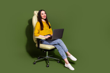 Canvas Print - Full length photo of cheerful pretty lady dressed yellow blouse communicating modern device empty space isolated khaki color background