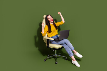 Canvas Print - Full length photo of shiny lucky lady dressed yellow blouse winning game modern device empty space isolated green color background