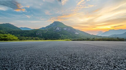 Wall Mural - A mountain range is visible in the distance with a road running through it