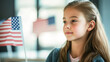 © Petruta - Young girl with an American flag, symbolizing patriotism and national pride.