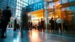 © andyaziz6 - Business People Networking in Modern Office Building with Glass Walls