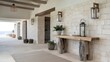 © BISO - A modern entrance hall with a coastal interior design. The wall has stone tiles, and there are wooden rustic elements, such as a console table and a lantern.