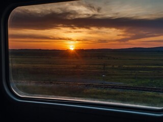 Sunset view from a train window